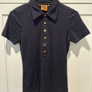 Tory Birch Navy Blue with gold monogram buttons.